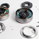 Illustration for article titled Exploded Mirrorless Lenses Reveal Beautiful, Compact Design